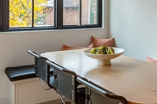 A bowl of fruit on top of a table.